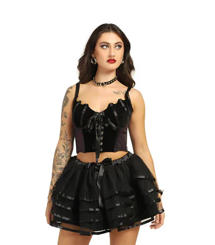 A girl wearing corset top