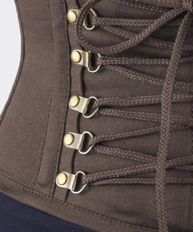 Brown corset with laces and metal hooks on a white background