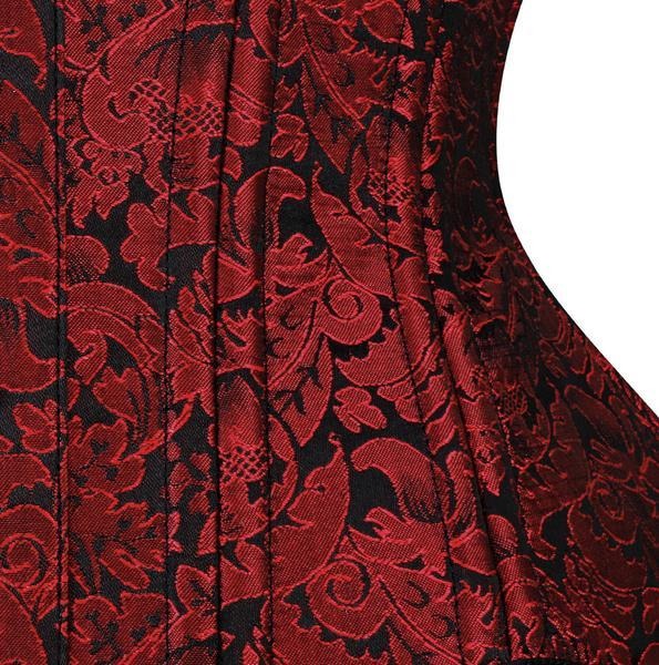 Close-up of a red and black damask brocade fabric with a pleated texture, shown against a white background.