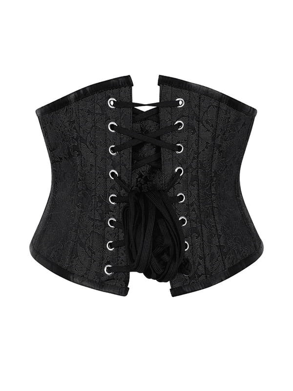 A black lace-up corset with a subtle damask pattern, featuring silver metal eyelets and black laces, shown against a plain white background.