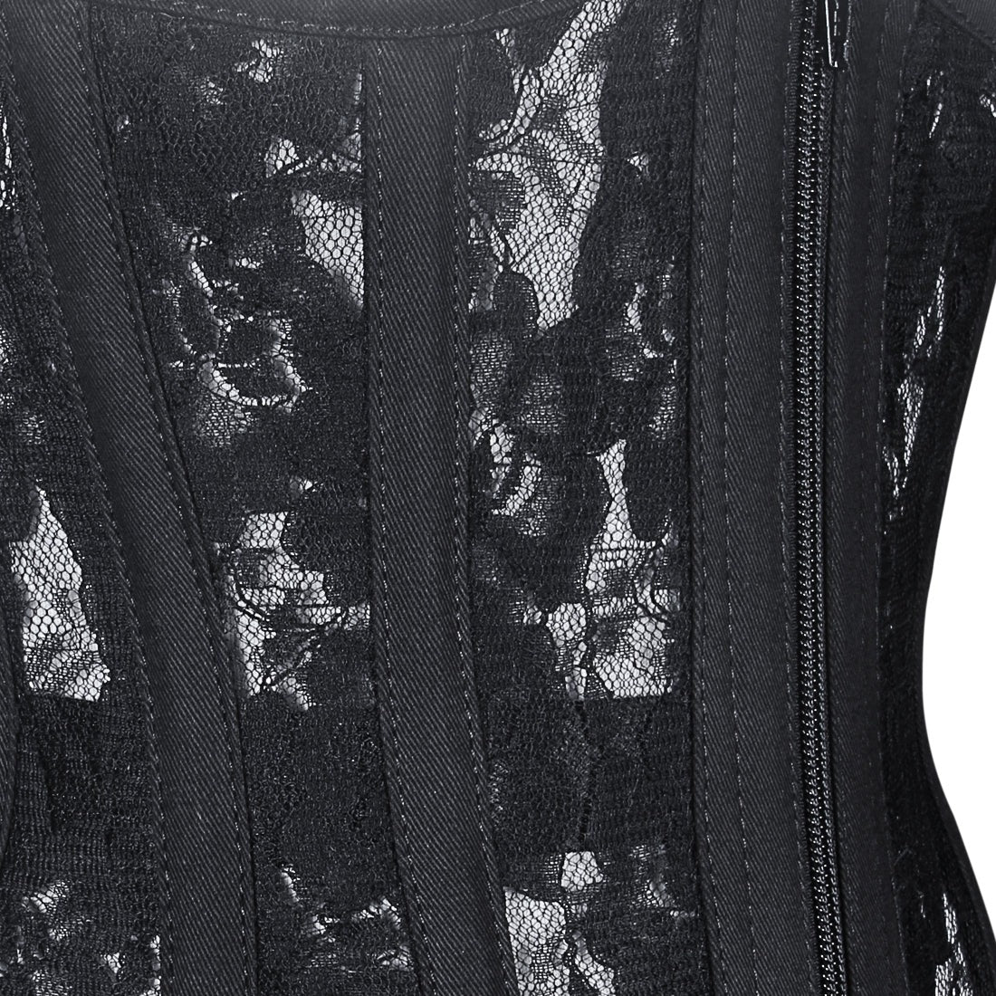 Close-up of a black lace corset with vertical boning and a side zipper.